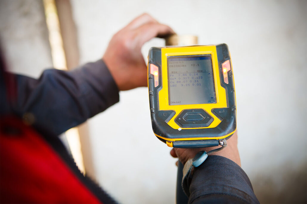 one of the best Handheld XRF Analyzers being used looking at the rear screen
